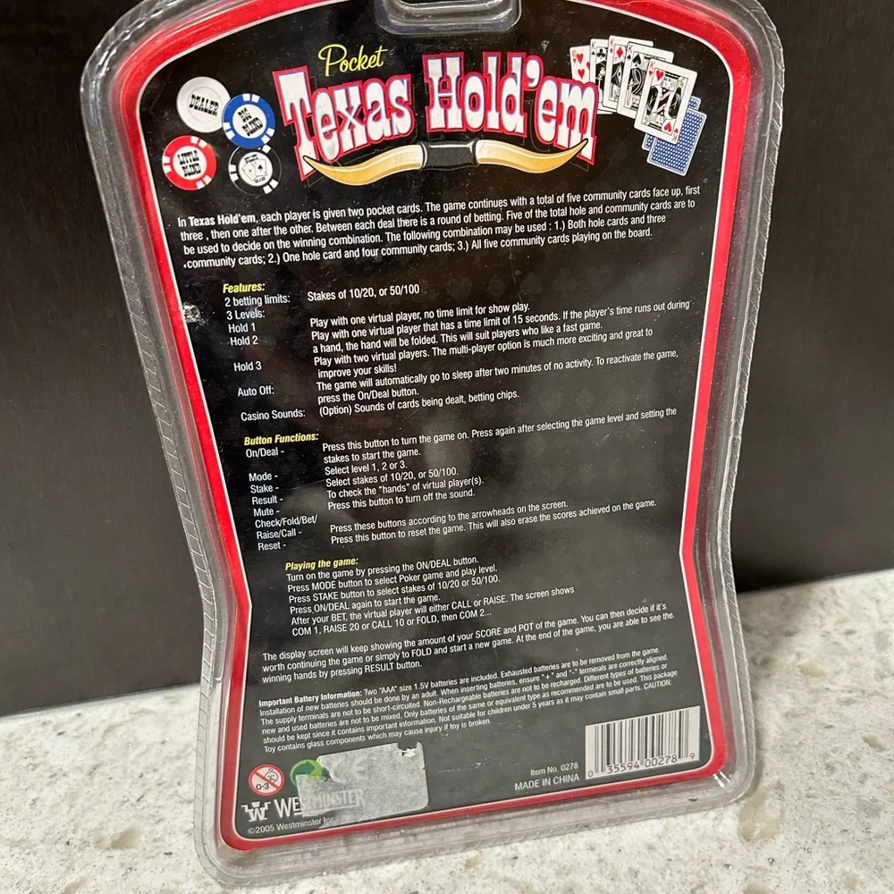 New in Package Texas Hold’em Hand Held Game Slight Package Damage. See photo.